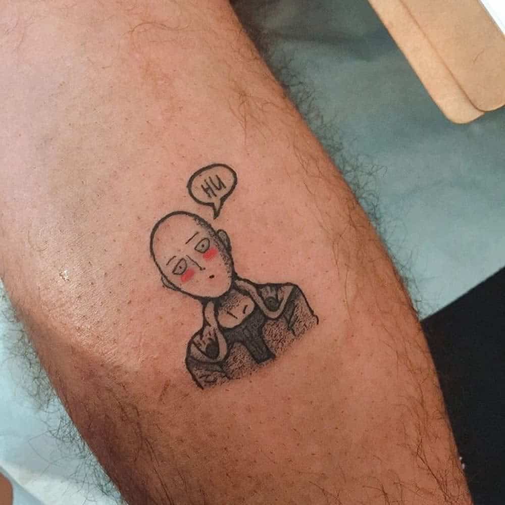Minimalist tattoo of Saitama from One Punch Man with a speech bubble saying 'Hi,' featuring a simple, cartoonish style with blush marks