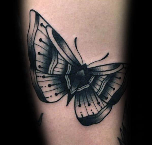 Small Ornate Black Ink Traditional Moth Arm Tattoo