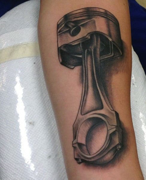 Small Piston Male Tattoo