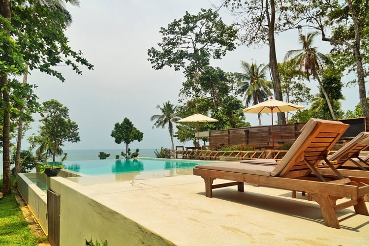 small resort above ground infinity pool deck