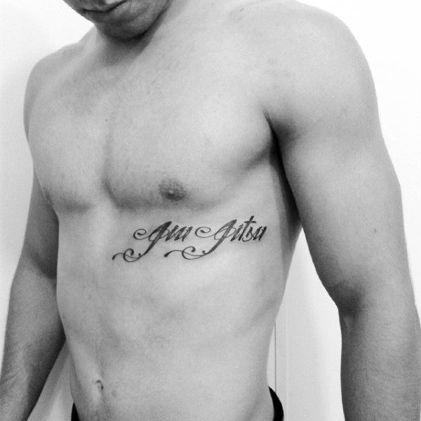 Small Script Jiu Jitsu Guys Rib Cage Tattoo