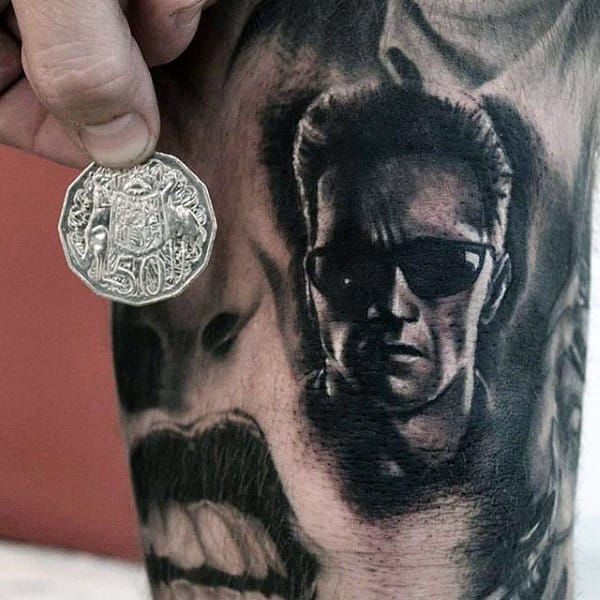 Small Shaded Guys Terminator Arm Tattoo