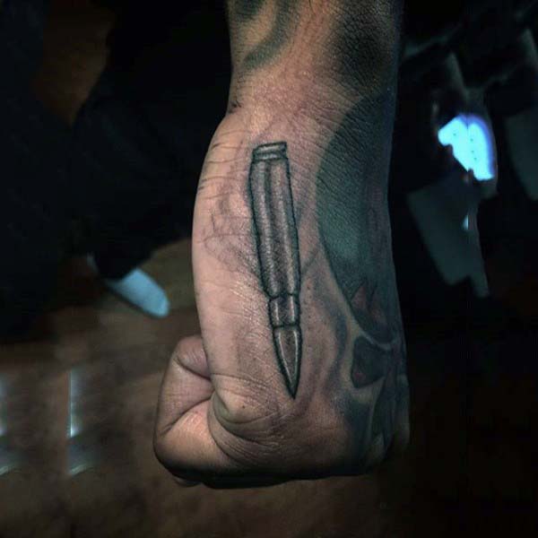 Small Silver Bullet Tattoo On Hand For Men