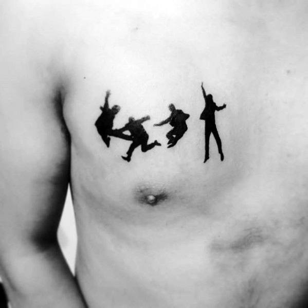 Silhouette chest tattoo of The Beatles mid-jump in playful poses, capturing their youthful energy and iconic early-era vibe.