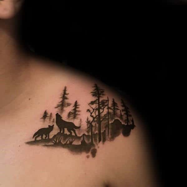 Small Simple Forest Wolves Tattoo For Men On Upper Chest
