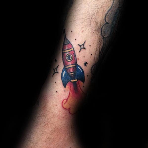 Small Simple Guys Rocket Ship Forearm Tattoo