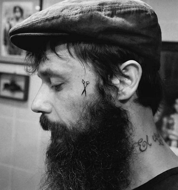 Small Simple Guys Scissor Face Tattoo