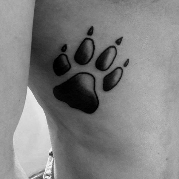 Small Simple Guys Shaded Old School Dog Paw Tattoo On Rib Cage Side