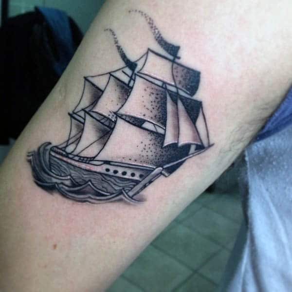 Small Simple Mens Tattoo Of Sailboat On Arm