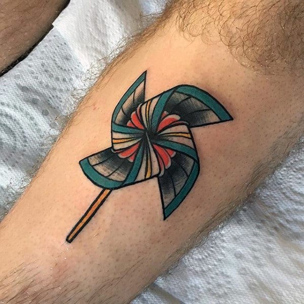 Small Simple Mens Traditional Pinwheel Windmill Leg Tattoo