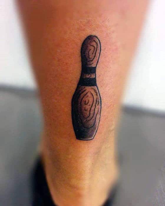 Small Simple Mens Wood Bowling Pin Tattoo On Lower Leg