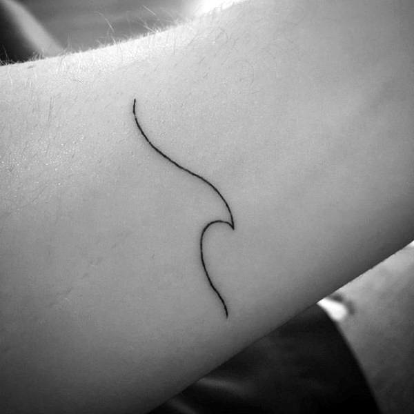 Minimalist wave tattoo on a forearm in black ink
