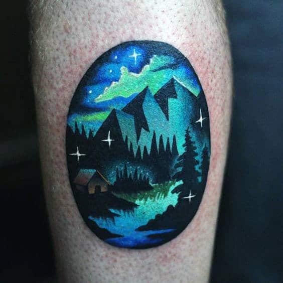 Small Simple Northern Lights Male Leg Tattoo