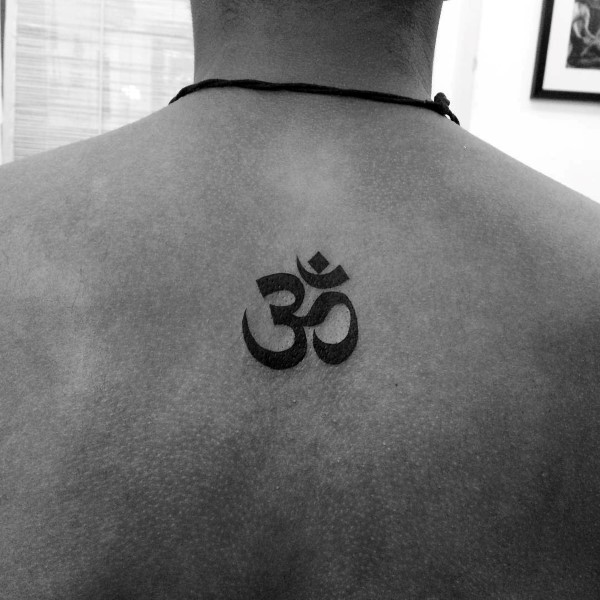 Small Simple Om Black Ink Tattoo On Mans Back