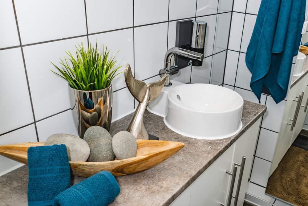 small white sink vanity in bathroom