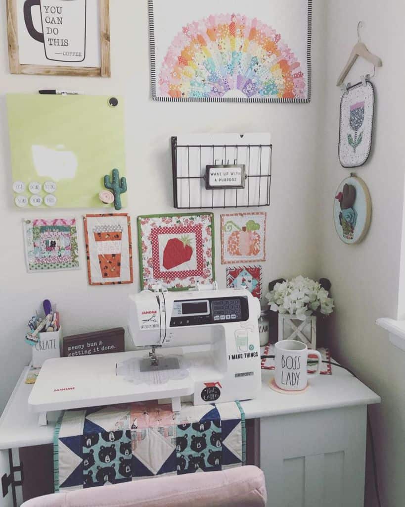 Cheerful sewing nook with colorful wall quilts, a modern sewing machine, inspiring decor, and a cozy vibe