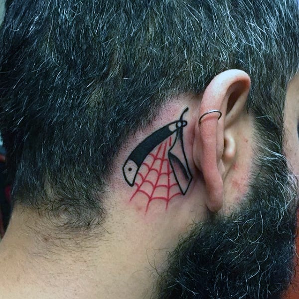 Small Straight Razor With Red Web Tattoo Guys Ear