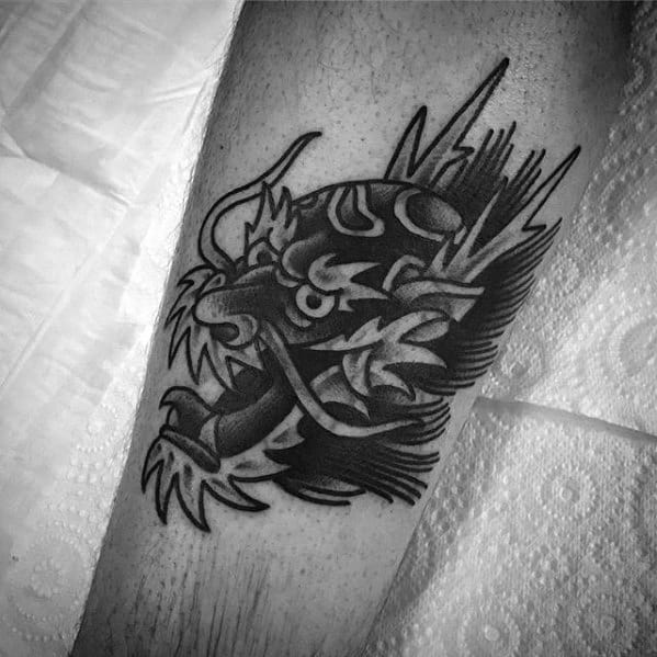 Small Traditional Dragon Shaded Black And Grey Ink Leg Tattoos For Men