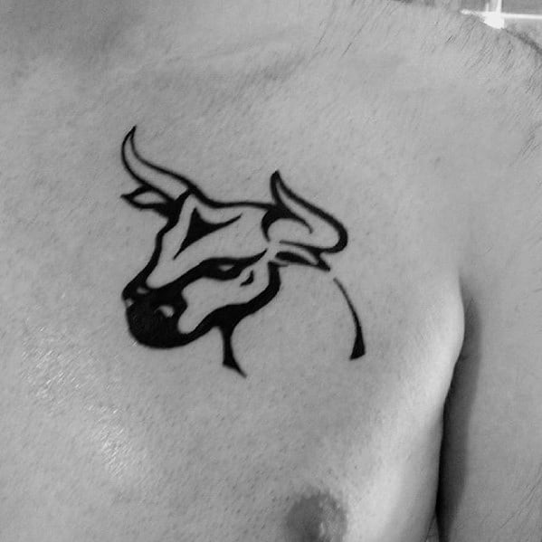 Small Tribal Bull Upper Chest Tattoo Designs For Guys