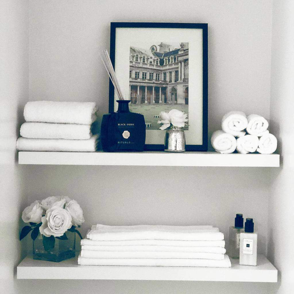 small wall bathroom shelves with towels