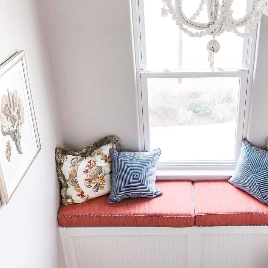 window nook seat orange pillows