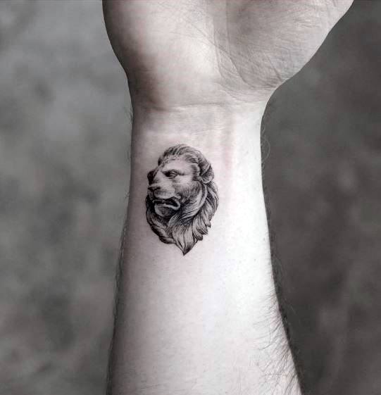 Small Wrist Guys Lion Statue Tattoo Design Ideas