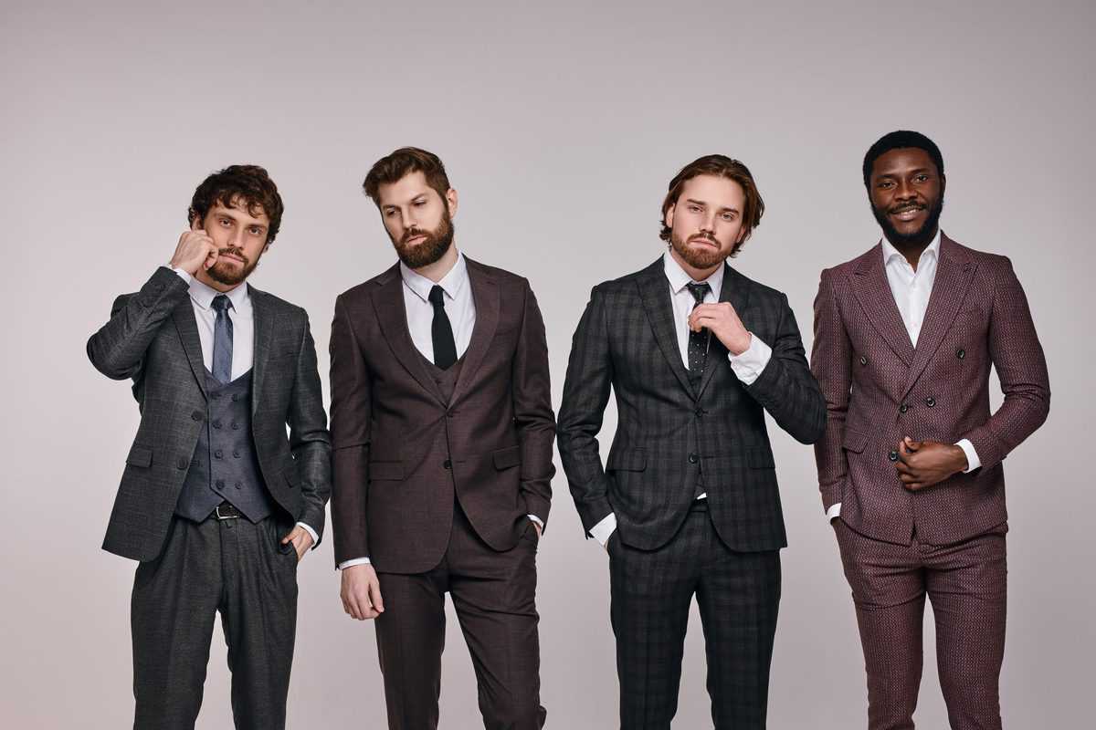 Confident,Executive,Business,People,In,Formal,Wear,Posing,At,Camera