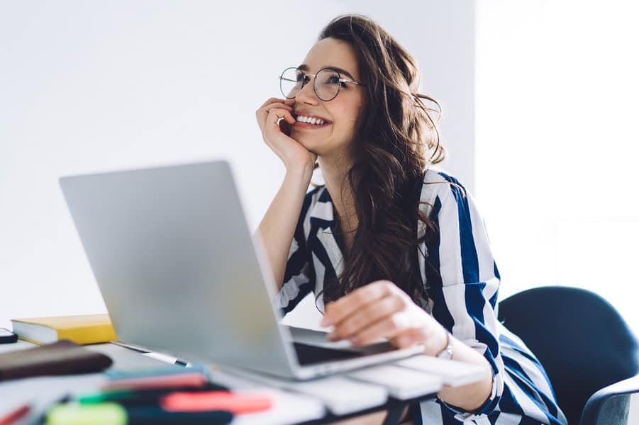 smiling woman while working