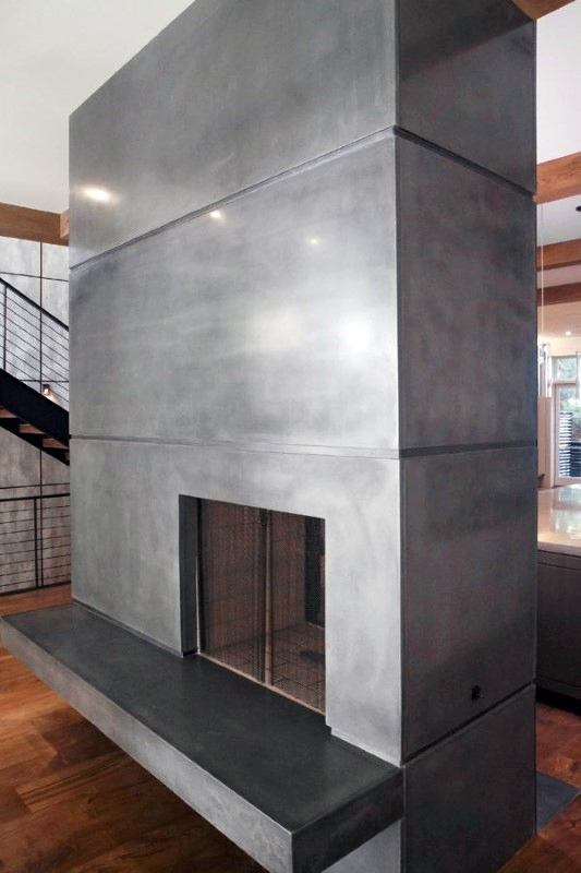 Polished concrete fireplace with sleek lines and a minimalist aesthetic, blending perfectly with modern interiors.