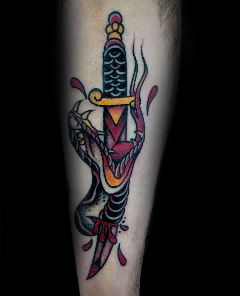 Traditional snake and dagger tattoo on forearm, featuring bold black, red, and yellow ink with blood drops and dynamic shading.