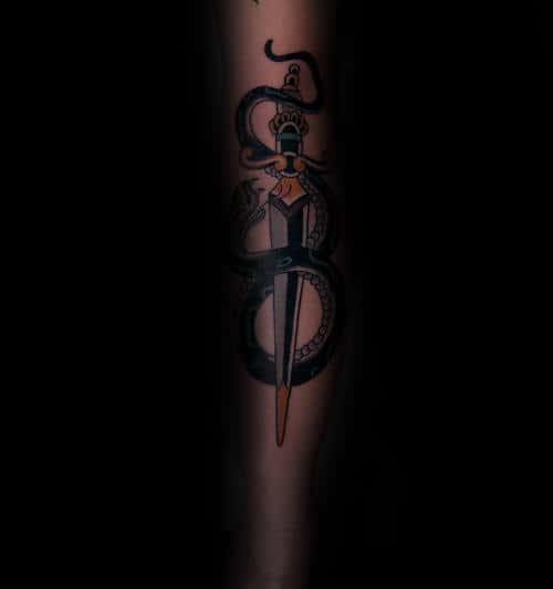 Snake With Dagger Gentlemens Traditional Leg Tattoo Design Ideas