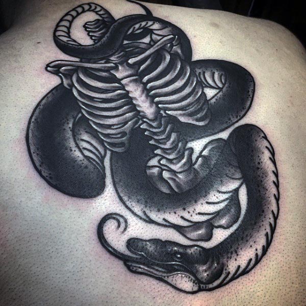 Snake Wrapped Around Skeleton Bones Mens Back Tattoo