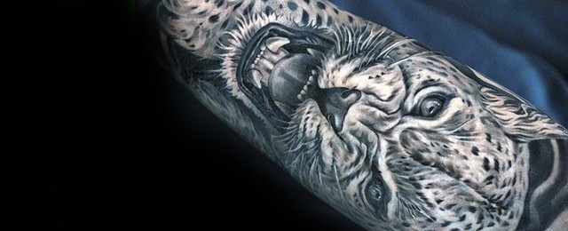 Snow Leopard Tattoo Designs For Men