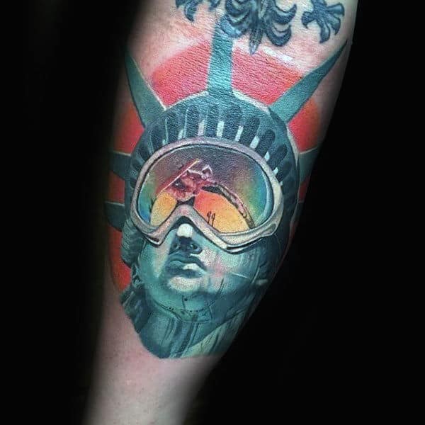 Snowboard Goggle On Statue Of Liberty Tattoo Male Forearms