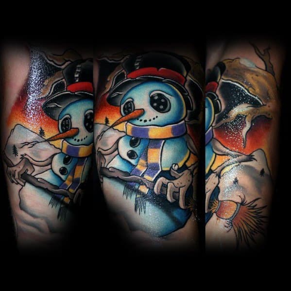 Dark-themed snowman tattoo with button eyes, a tattered scarf, eerie twig hands, and a fiery sunset background, blending winter with a haunting aesthetic.