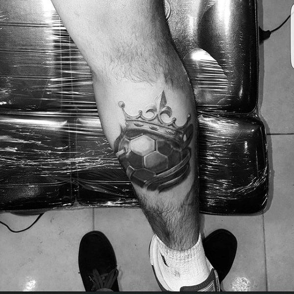 Soccerball With Crown Mens Leg Tattoo