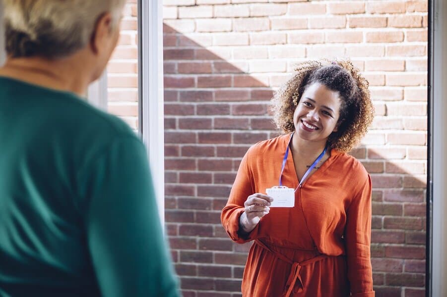 social worker visiting of a senior womans home