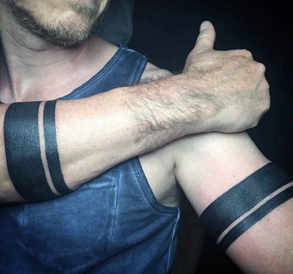 Solid Black Armband Tattoos On Man