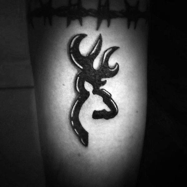 Solid Black Ink Browning Tatoo With White Ink Accents On Man