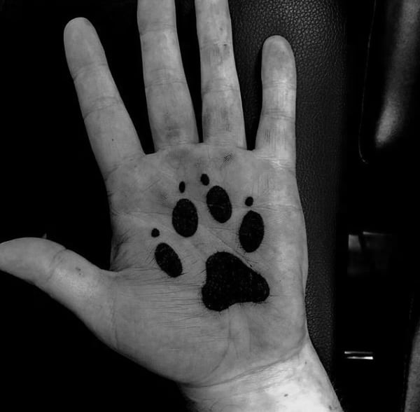 Solid Black Ink Dog Paw Palm Tattoo For Men