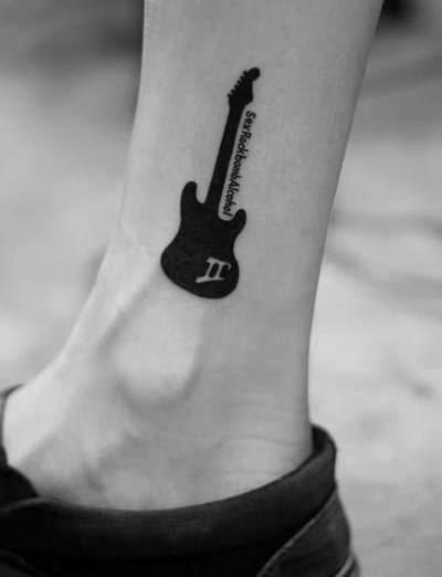 Solid Black Ink Guitar With Negative Space Music Note Guys Simple Leg Tattoo
