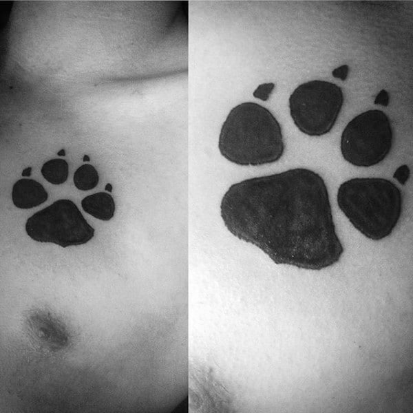 Solid Black Ink Guys Wolf Paw Chest Tattoos