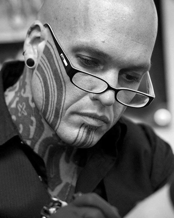 Solid Black Ink Lines Male Face Tattoo Ideas