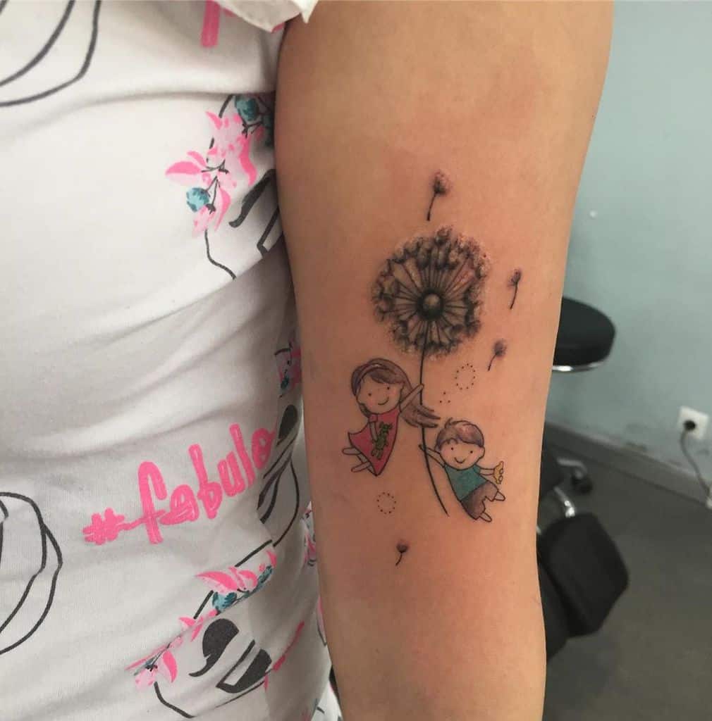 Playful dandelion tattoo on the arm featuring two children holding onto the stem, symbolizing innocence, joy, and carefree childhood memories.