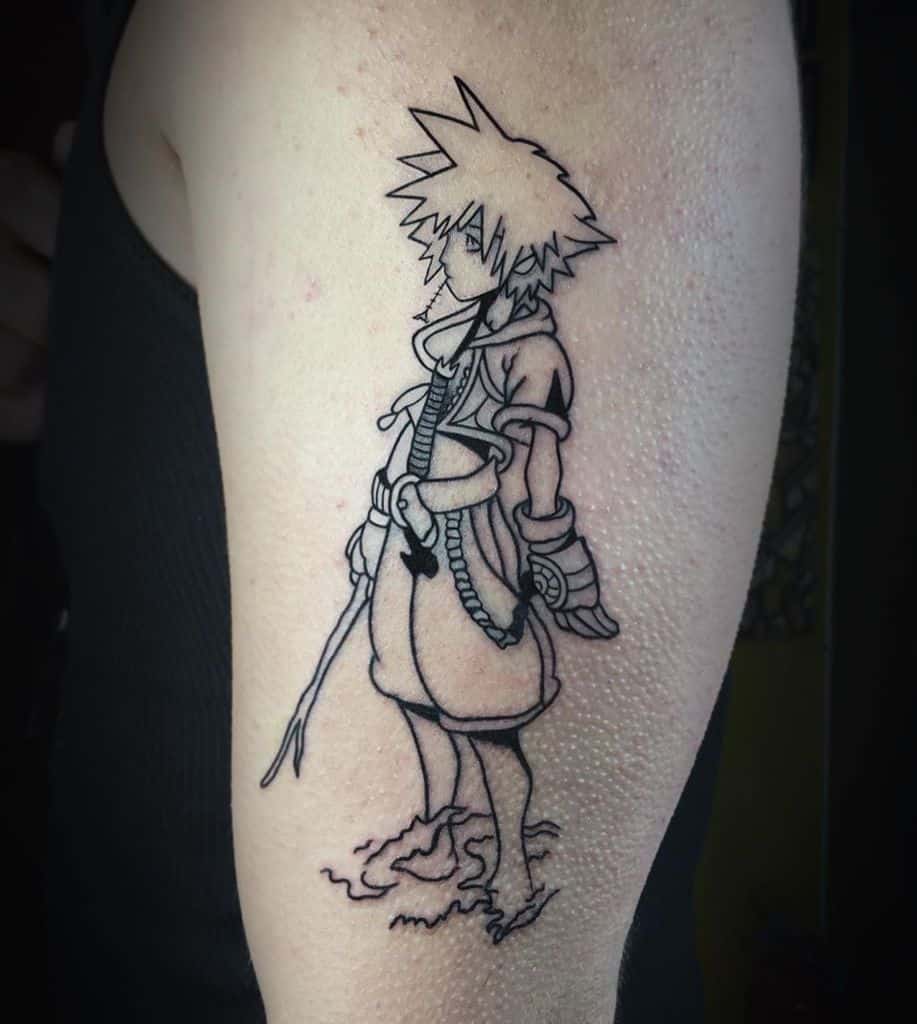 Black ink tattoo of Sora from Kingdom Hearts standing in water, holding a Keyblade, with detailed linework on the upper arm.