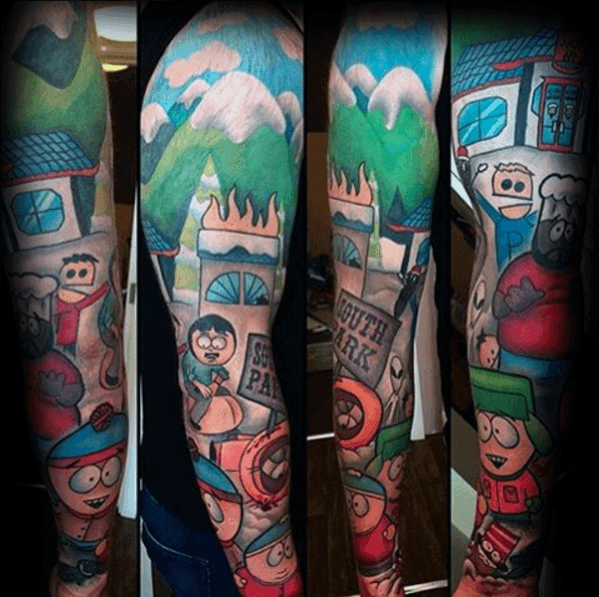 Full-sleeve South Park tattoo featuring main characters, iconic locations, and a vibrant mountain backdrop with bold colors and shading.