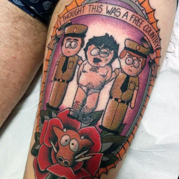 South Park-style tattoo of Randy Marsh being arrested with the quote “I thought this was a free country” above and a cartoon rose below.