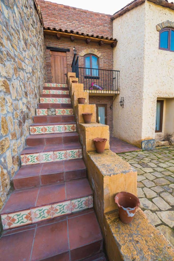 narrow staircase spanish-style house 