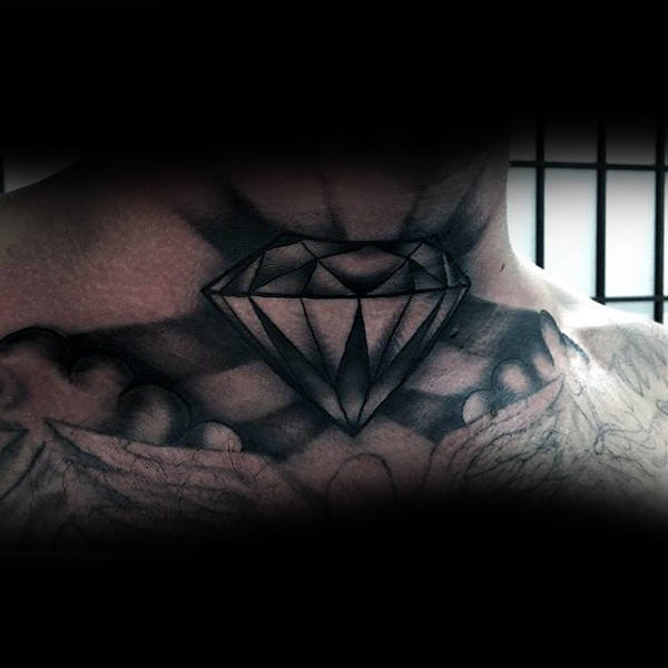 Black and grey throat tattoo of a geometric diamond with shading that creates a glowing effect, blending into surrounding chest designs
