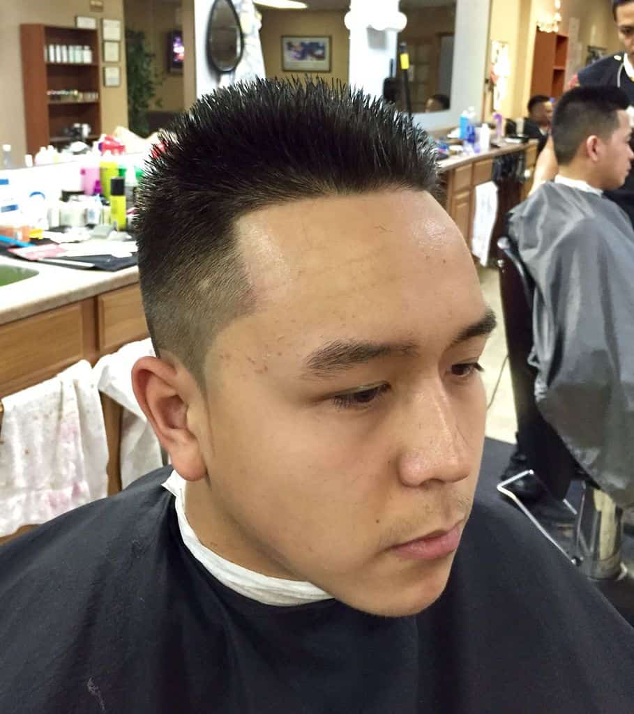 Faded hair with spiked manes on top